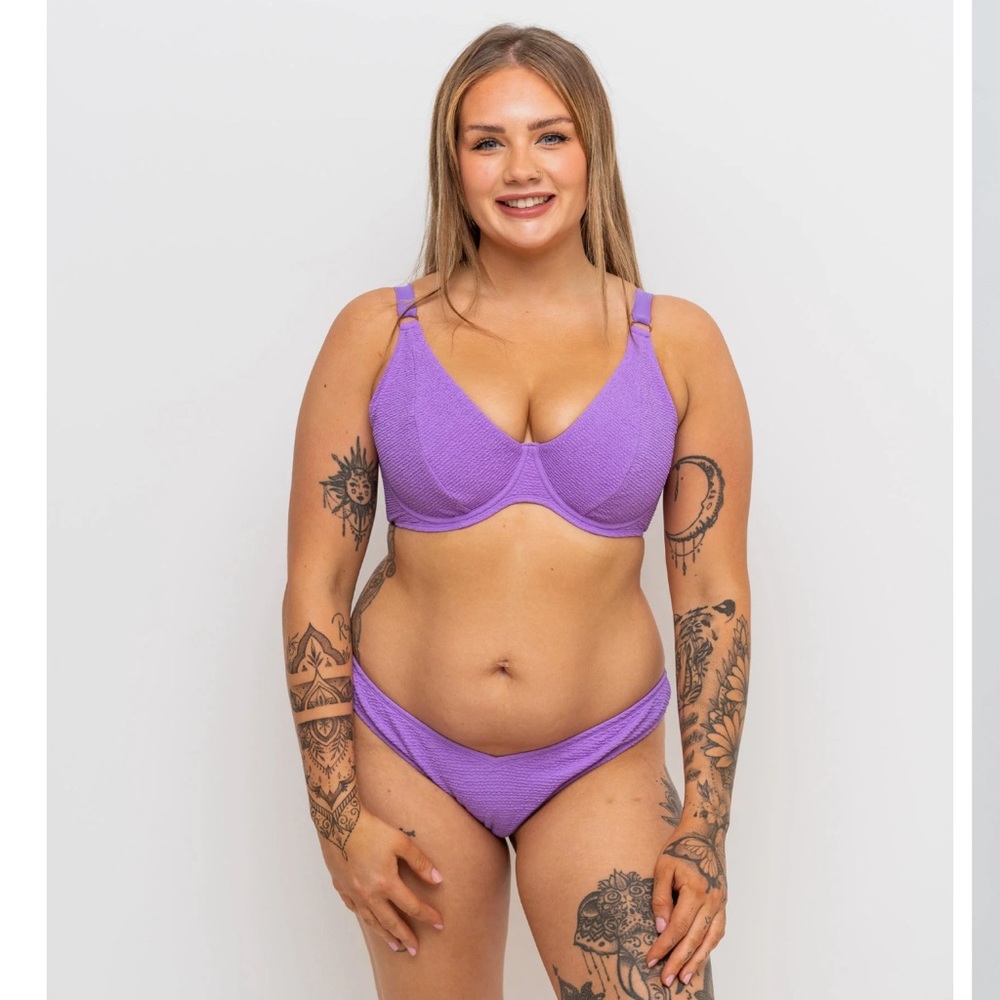 Purple swim suit, new with tags, never worn